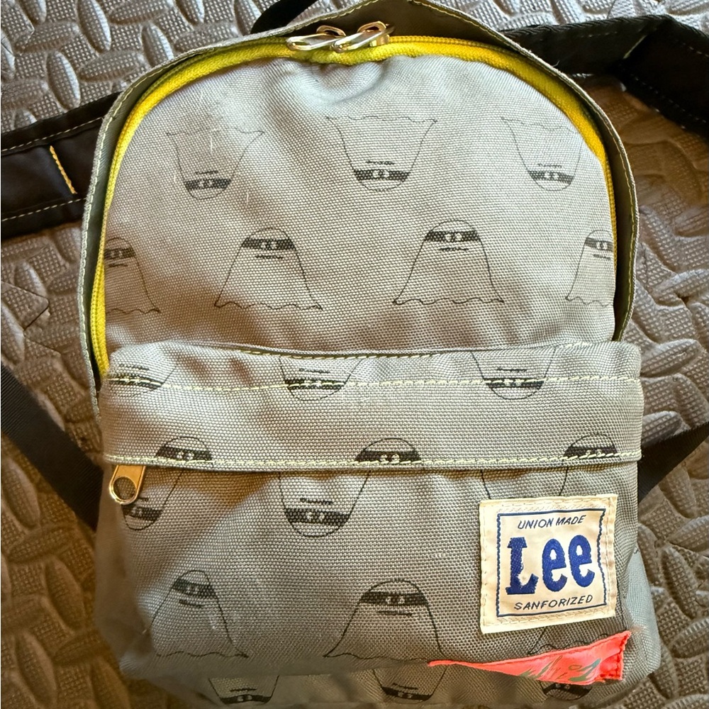 Lee Gee Whiz Gray and Yellow Mini Backpack with Graphic Printed Design